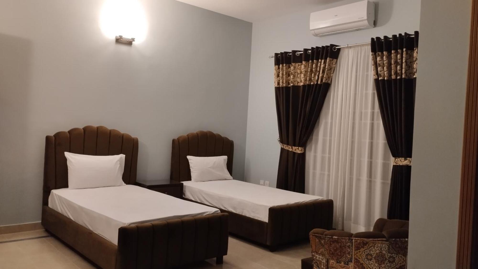Islamabad Travelodge Guest House Zimmer foto